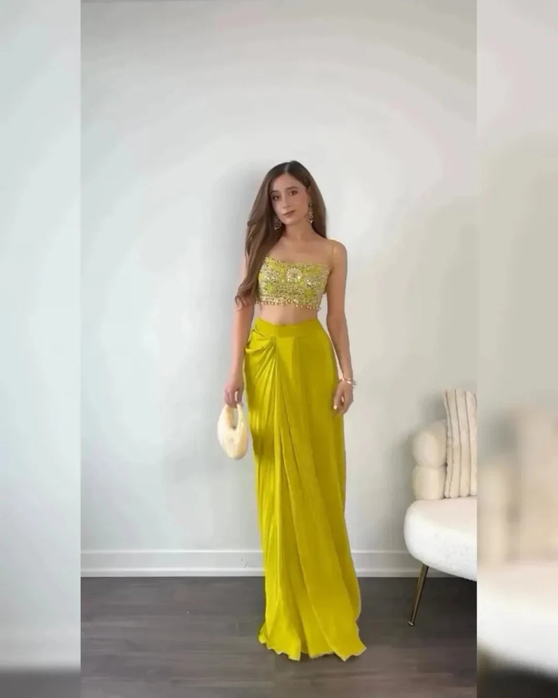 Yellow chinnon dhoti pants with sequined crop top and light sheer dupatta