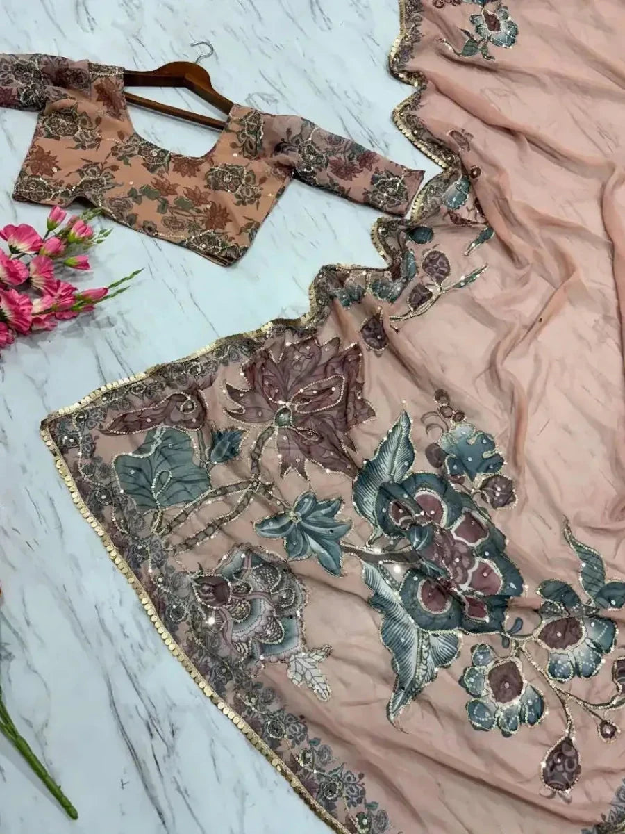 Beige saree fabric with teal floral mirror and sequin embroidery, wide decorative border