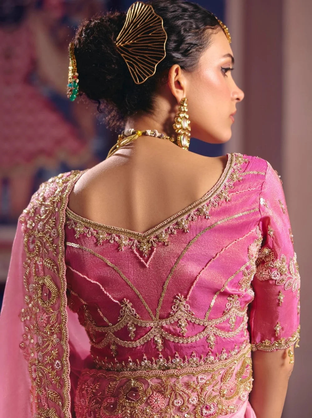 Pink tissue silk saree with beadwork and zari detailing