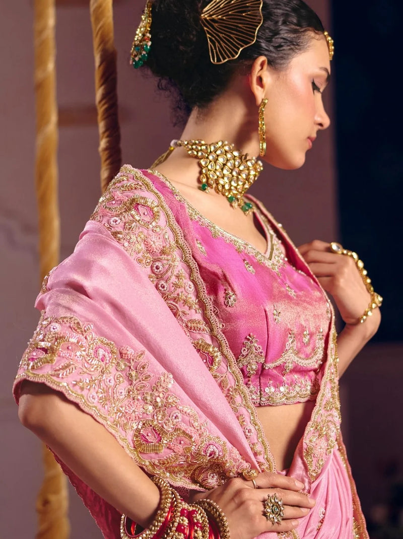 Pink tissue silk saree with beadwork and zari detailing