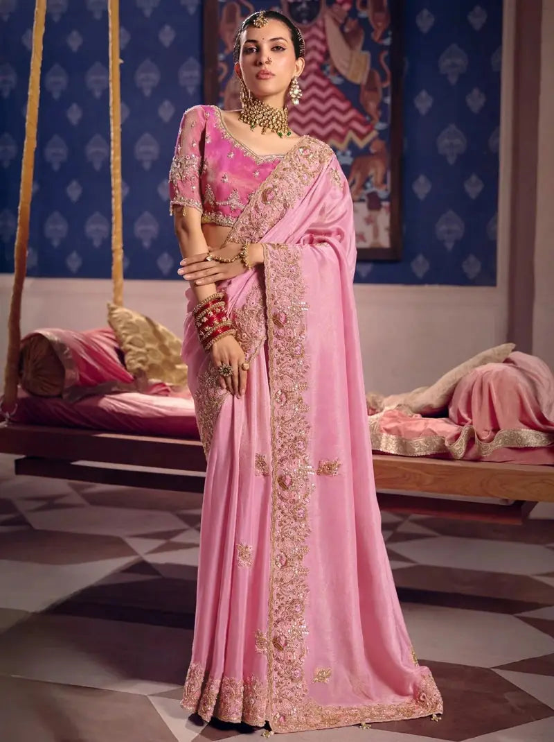 Pink tissue silk saree with beadwork and zari detailing