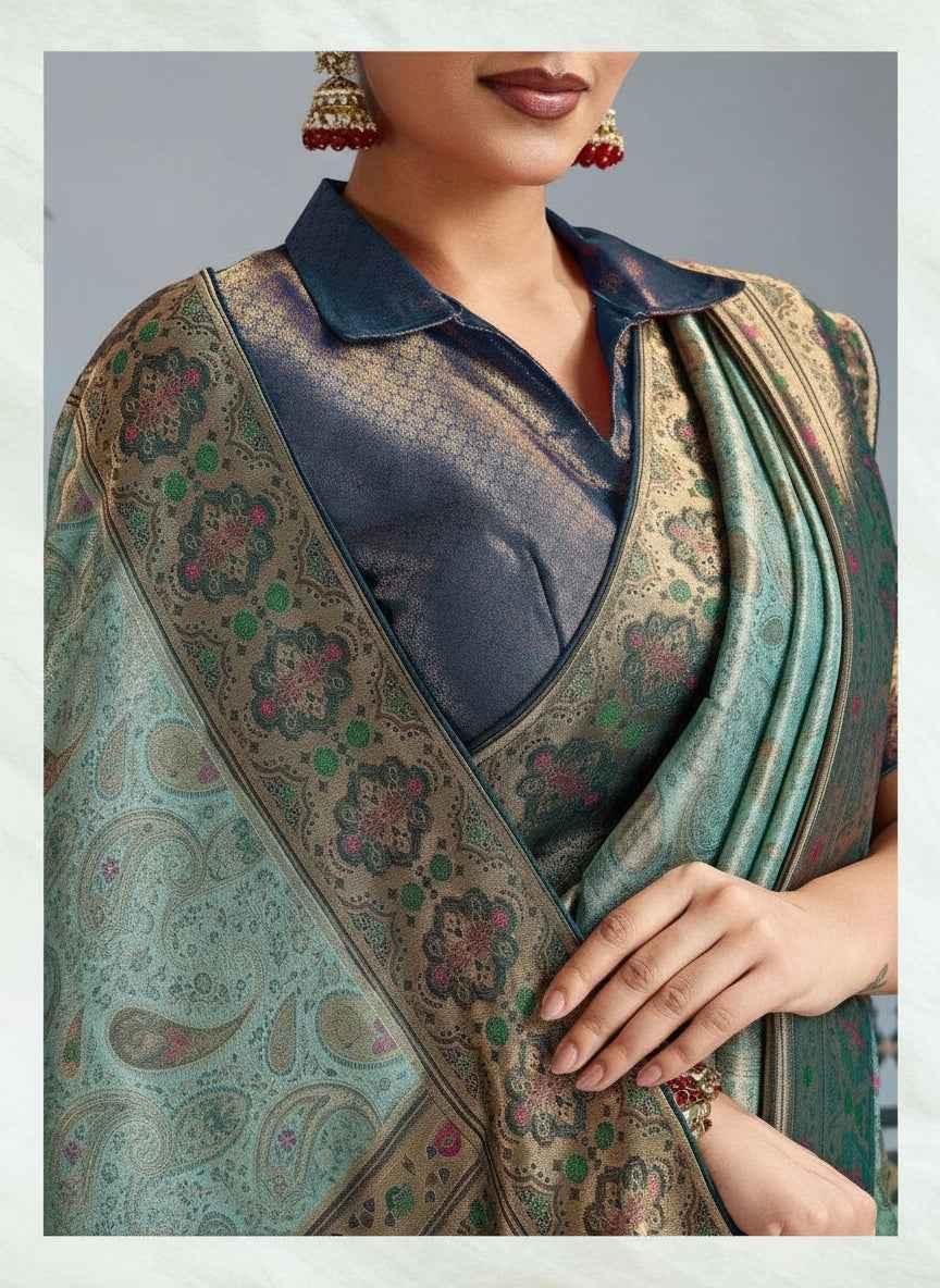 Close-up of a woman wearing a platinum Kanjivaram silk saree with meenakari zari weaving and a brocade collar blouse