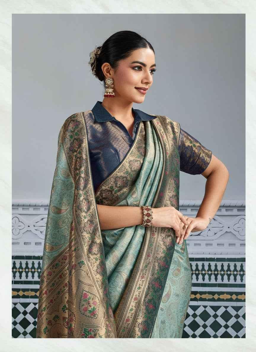 Woman wearing platinum Kanjivaram silk saree with meenakari zari brocade and collar blouse