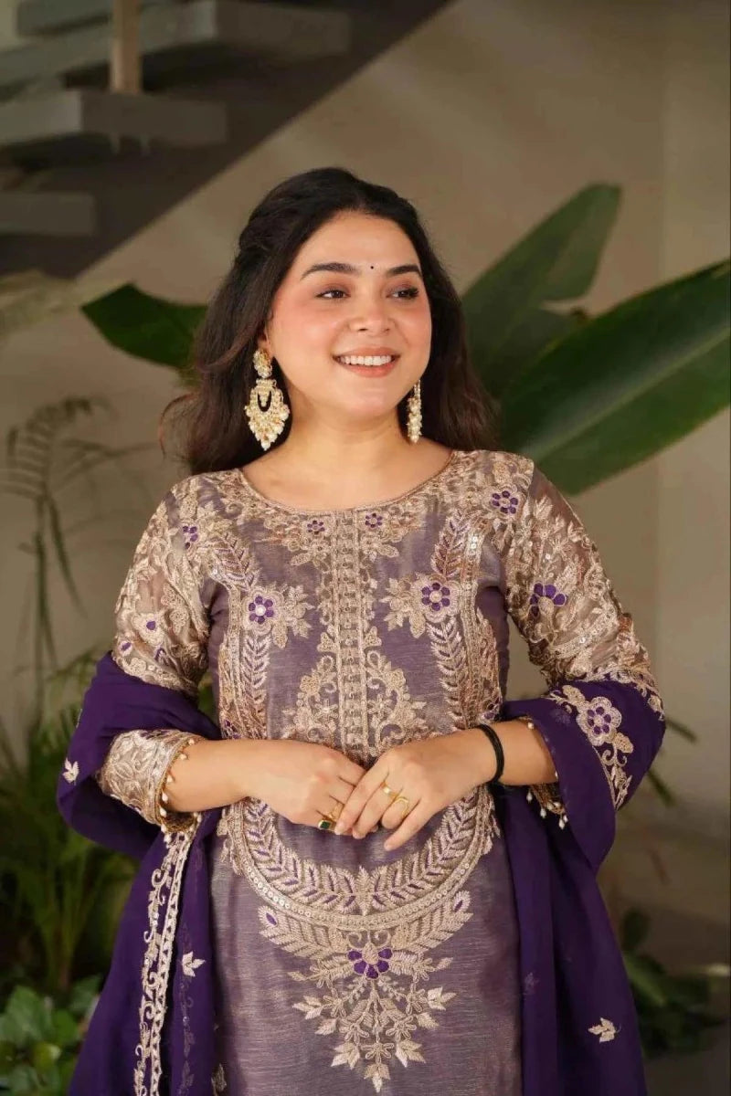 Embroidered purple tunic with gold floral motifs and matching flared sharara skirt