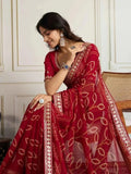 Red georgette bandhani saree with embroidered border and woven gold motifs