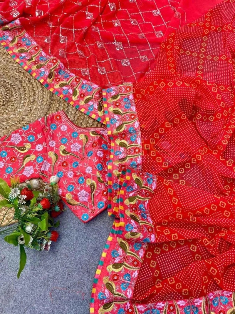 Red georgette saree close-up with bandhani motifs, sequined texture, colorful border