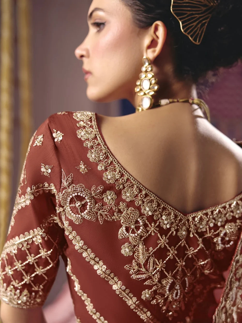 Rust viscose zari tissue embroidered saree