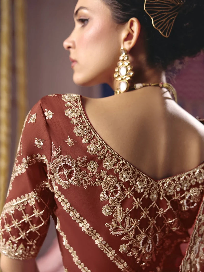 Rust viscose zari tissue embroidered saree