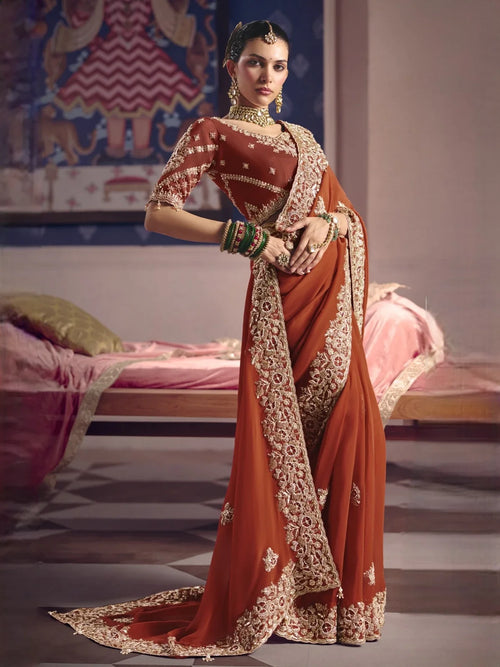 Rust viscose zari tissue embroidered saree