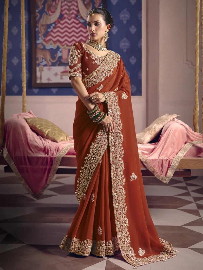 Rust viscose zari tissue embroidered saree