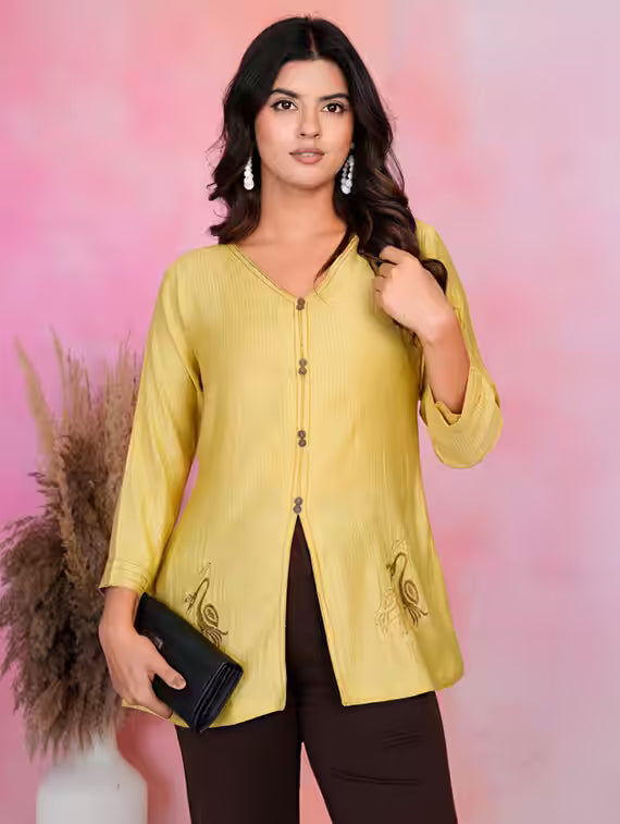 Amber embroidered cotton-silk top with 3/4 sleeves, button front, and side slit